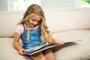 Little-girl-reading-picture-book.jpg