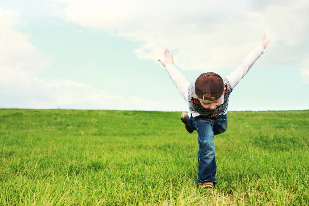 Kids-Playing-in-Grass