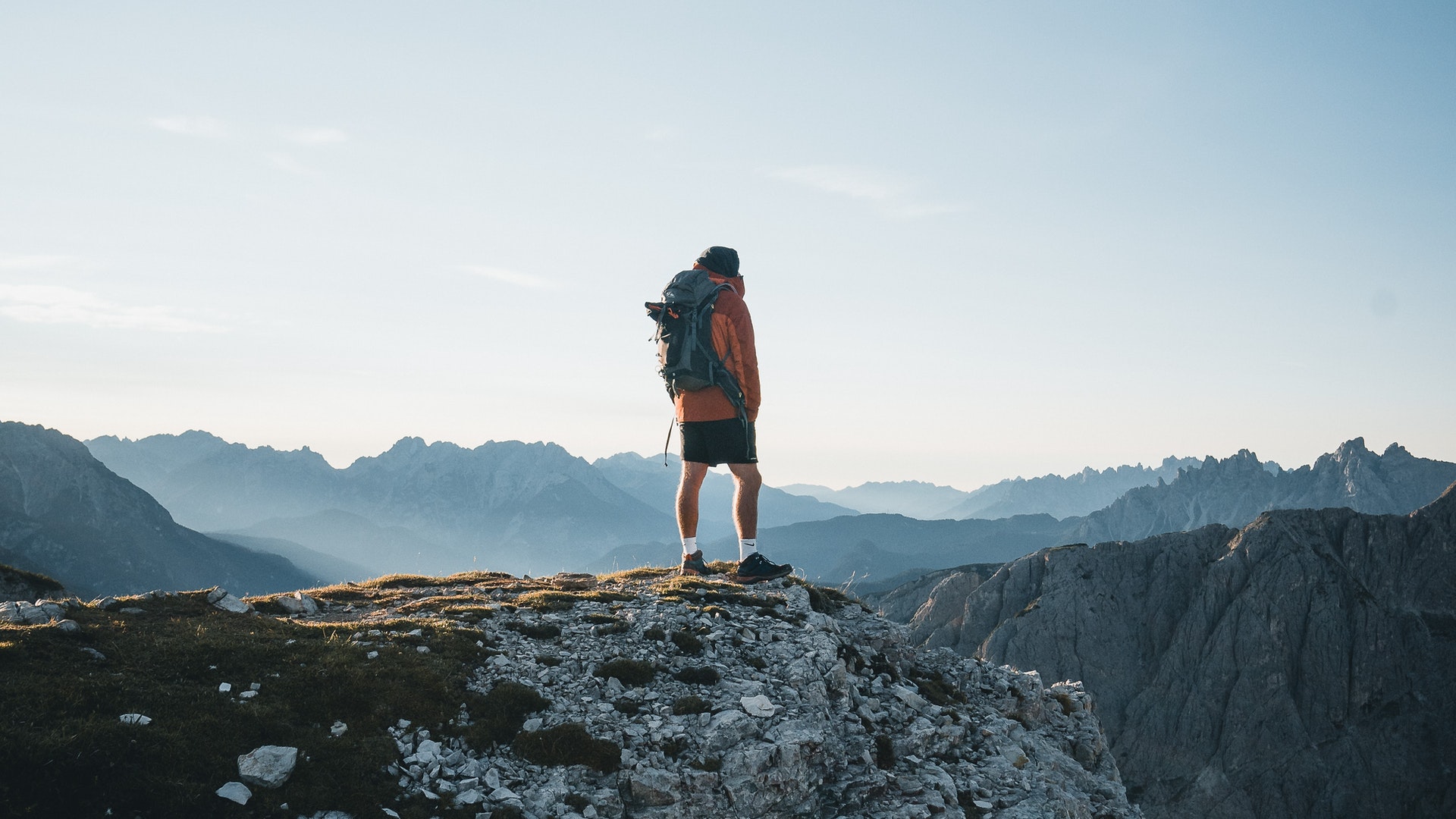 Man standing on top of mountain