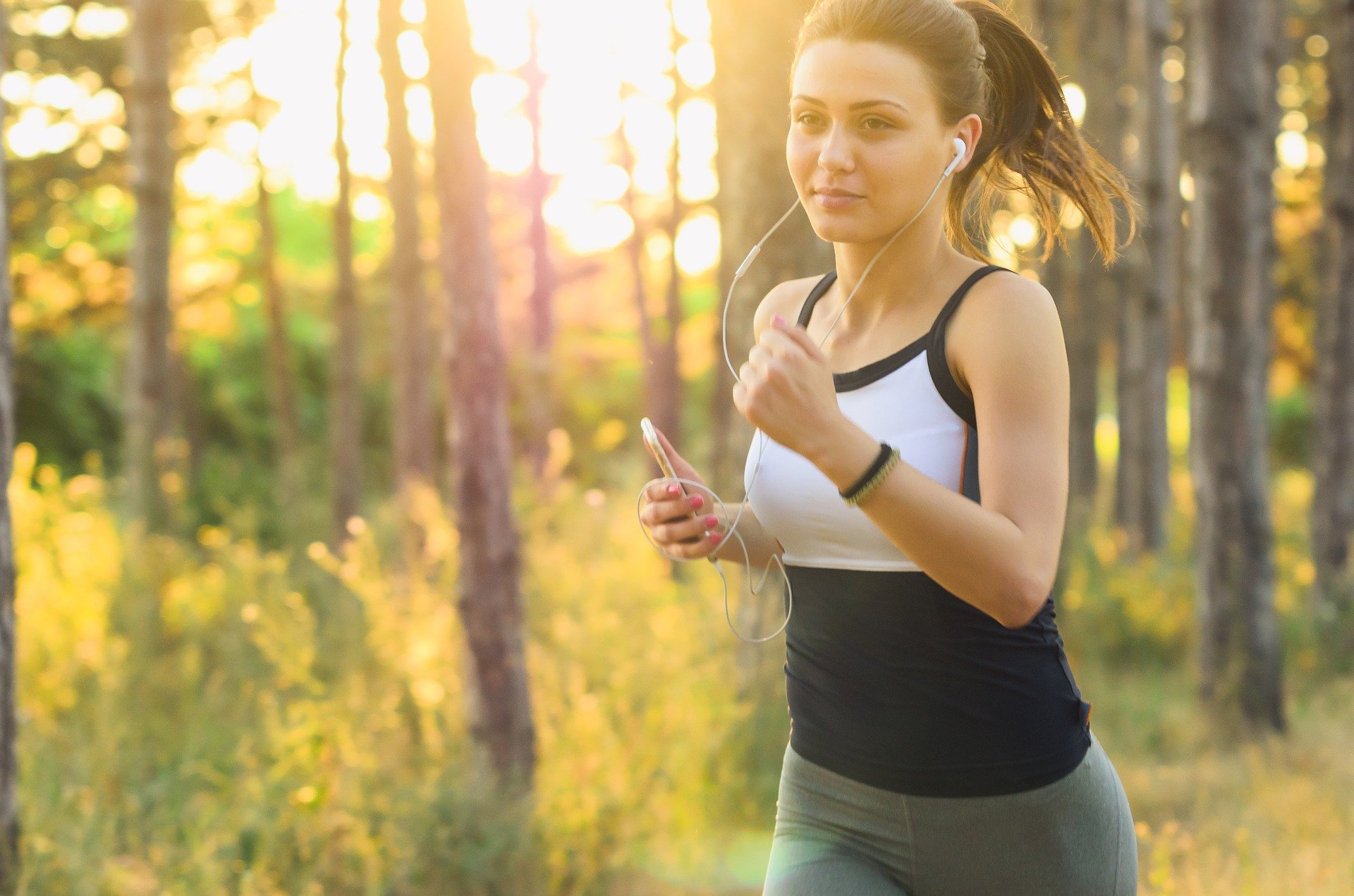 Woman jogging in woods